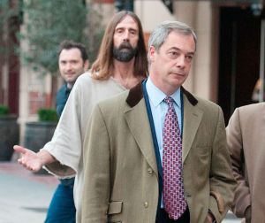 Nigel Farage has been followed around by a man dressed as Jesus (Picture: Rex) 